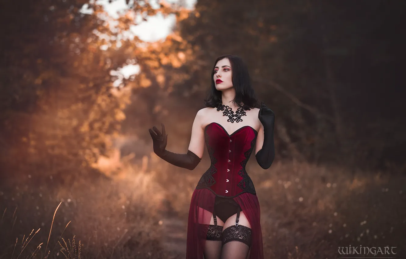 Photo wallpaper autumn, forest, grass, look, girl, trees, nature, pose