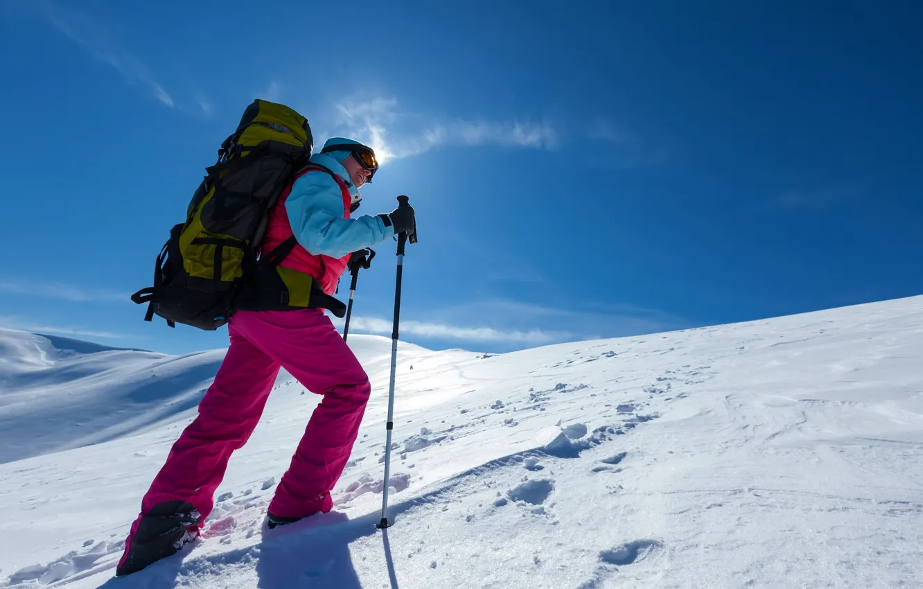 Photo wallpaper winter, the sky, the sun, snow, mountains, glasses, jacket, costume