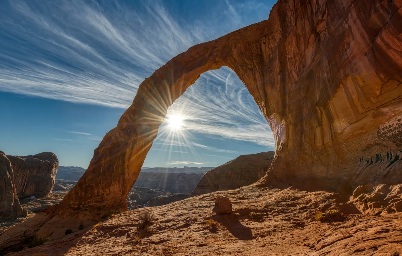 Photo wallpaper the sun, clouds, rays, light, mountains, blue, stones, rocks