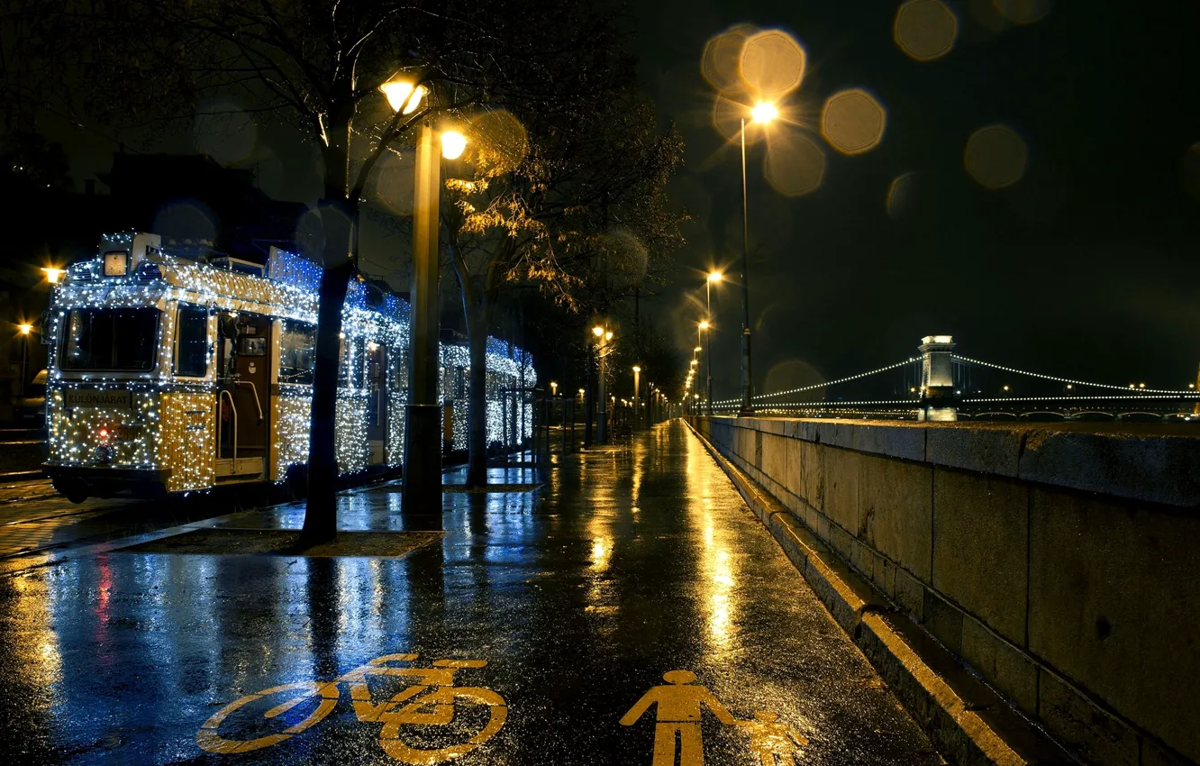 Photo wallpaper road, asphalt, night, the city, river, lighting, lights, tram