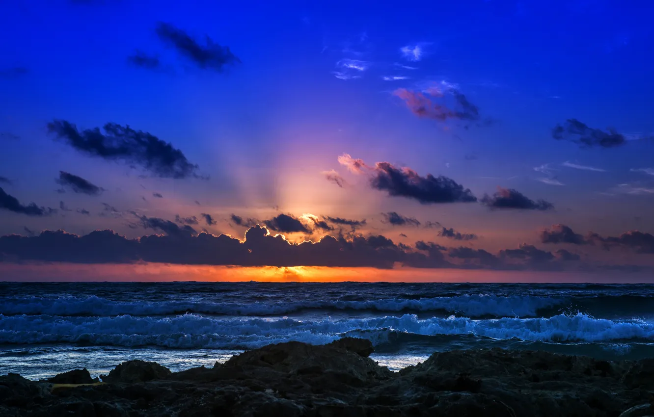 Photo wallpaper sea, wave, the sky, clouds, sunset, rocks, shore, horizon