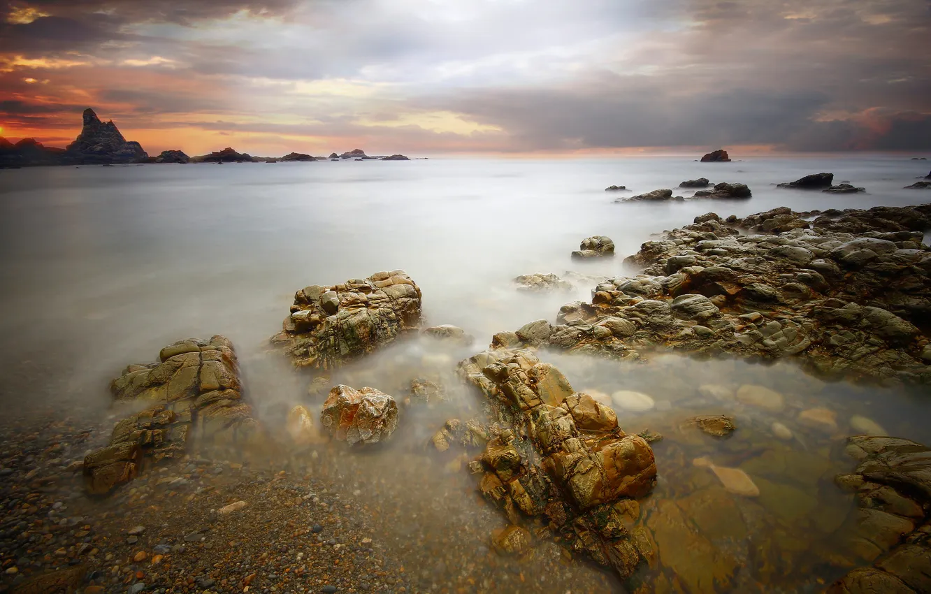 Photo wallpaper sea, the sky, clouds, sunset, stones, rocks