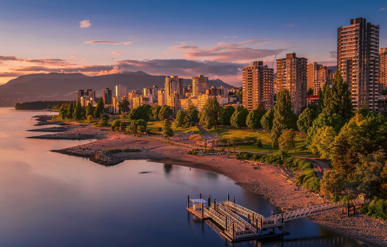 Photo wallpaper beach, the sky, clouds, light, trees, sunset, mountains, the city