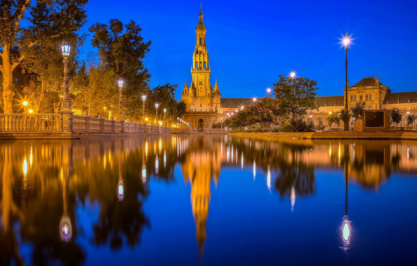Photo wallpaper reflection, river, tower, lights, night city, Spain, Spain, Seville