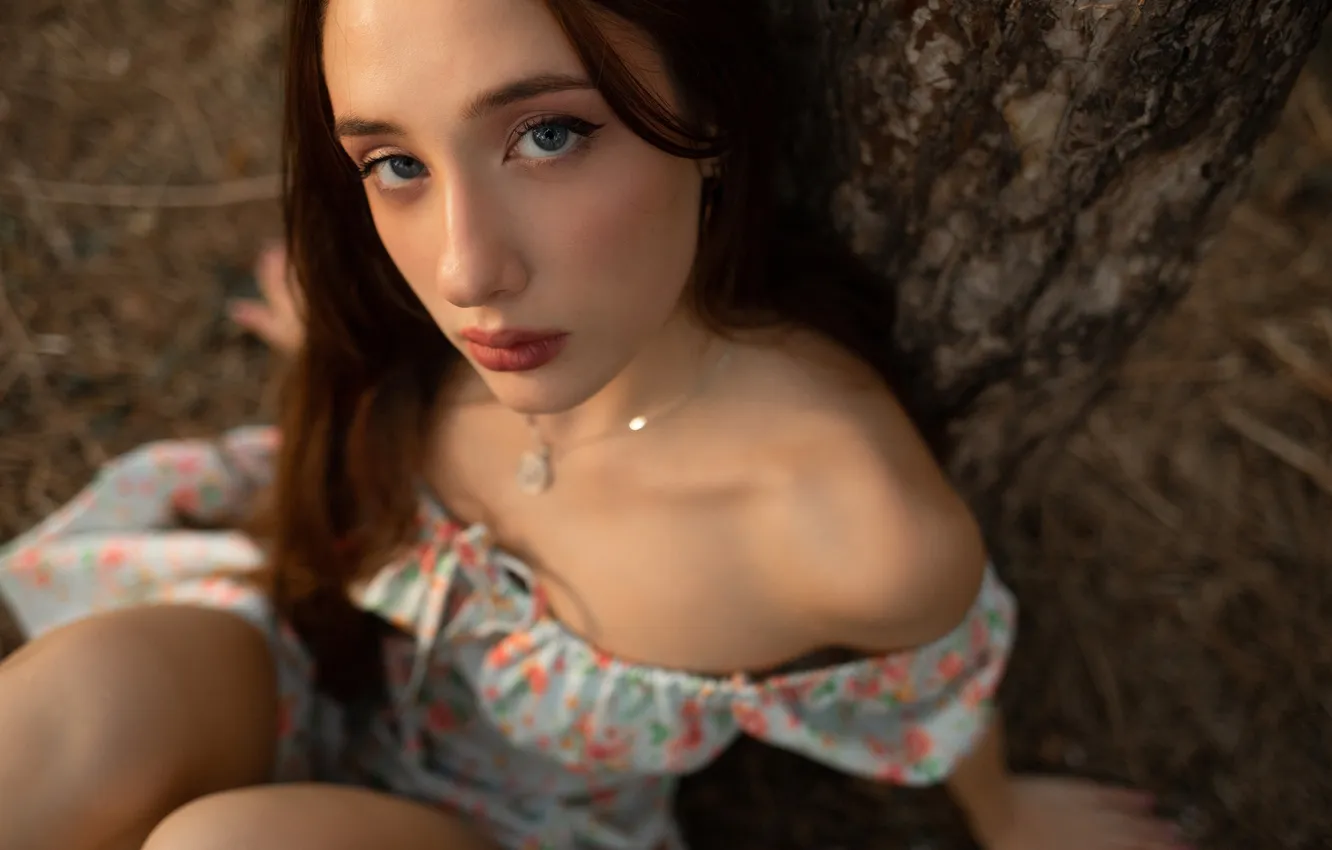 Photo wallpaper girl, trees, nature, model, brunette, sitting, red lipstick, looking at viewer