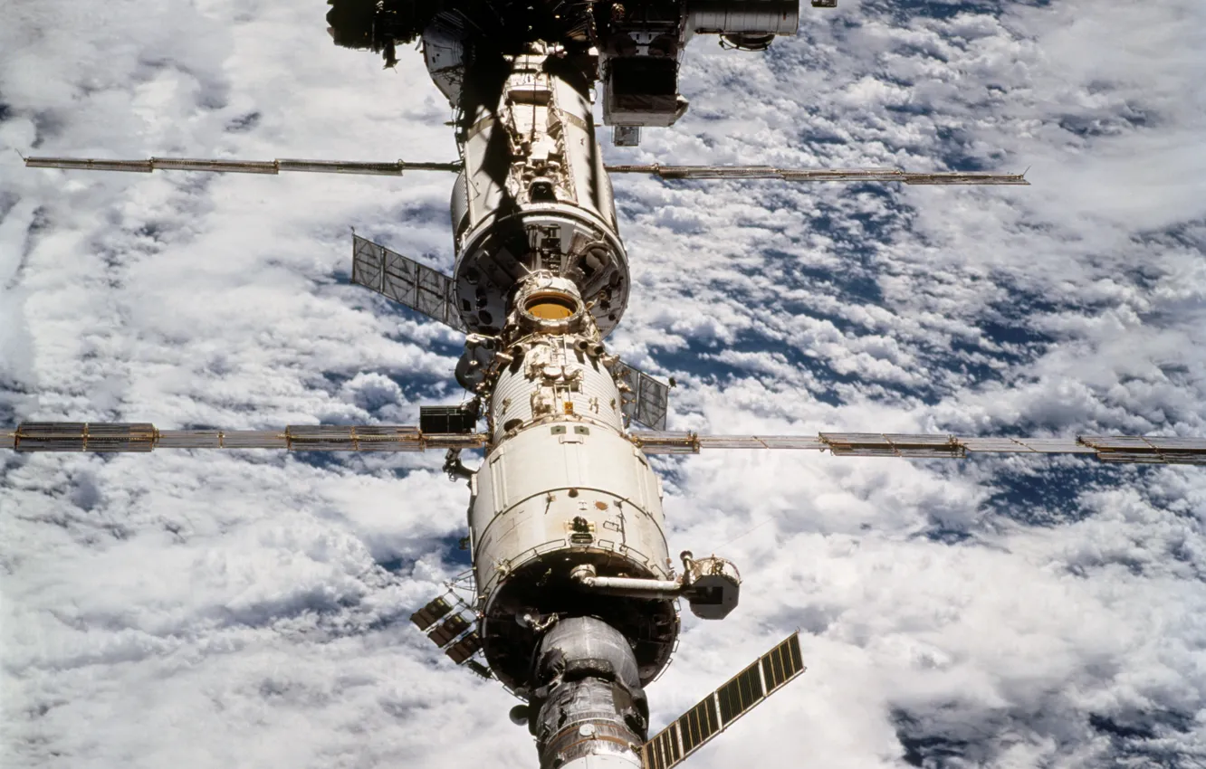 Photo wallpaper space, clouds, ISS