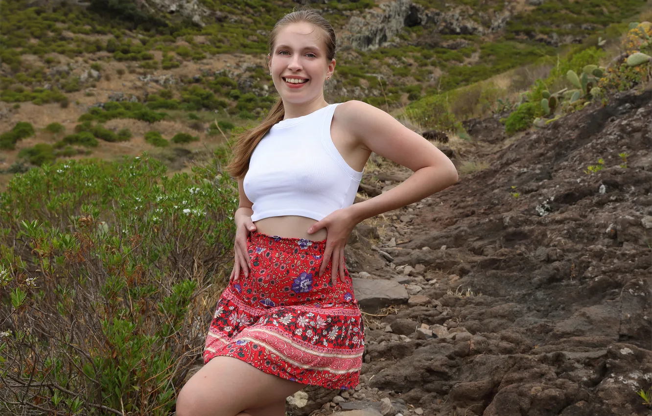 Photo wallpaper nature, model, brunette, hillside, gorgeous, posing, skirt, beautiful face