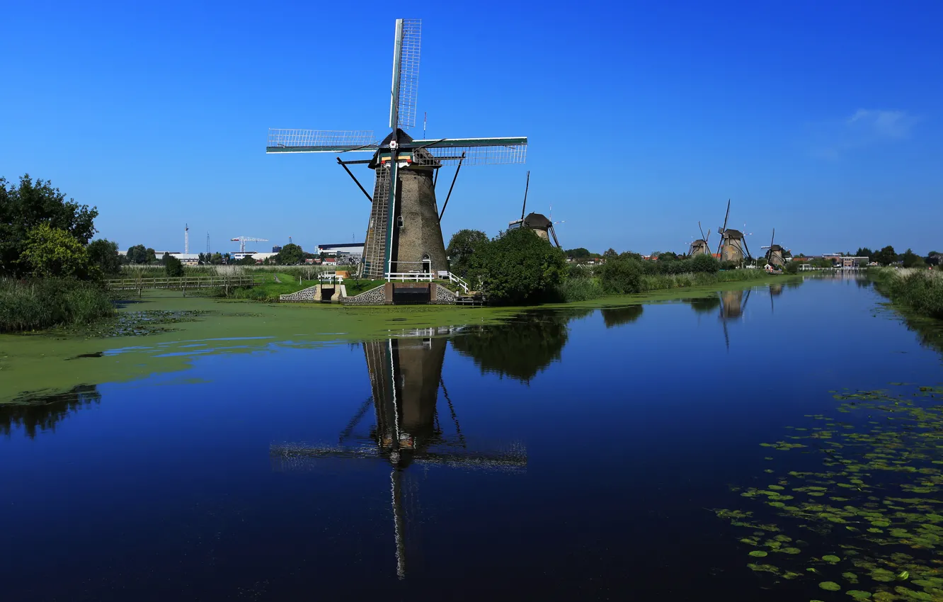 Photo wallpaper the sky, water, channel, Netherlands, windmill