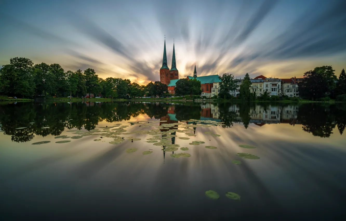 Photo wallpaper the sky, trees, sunset, pond, Germany, temple, Lubeck, Lübeck Cathedral