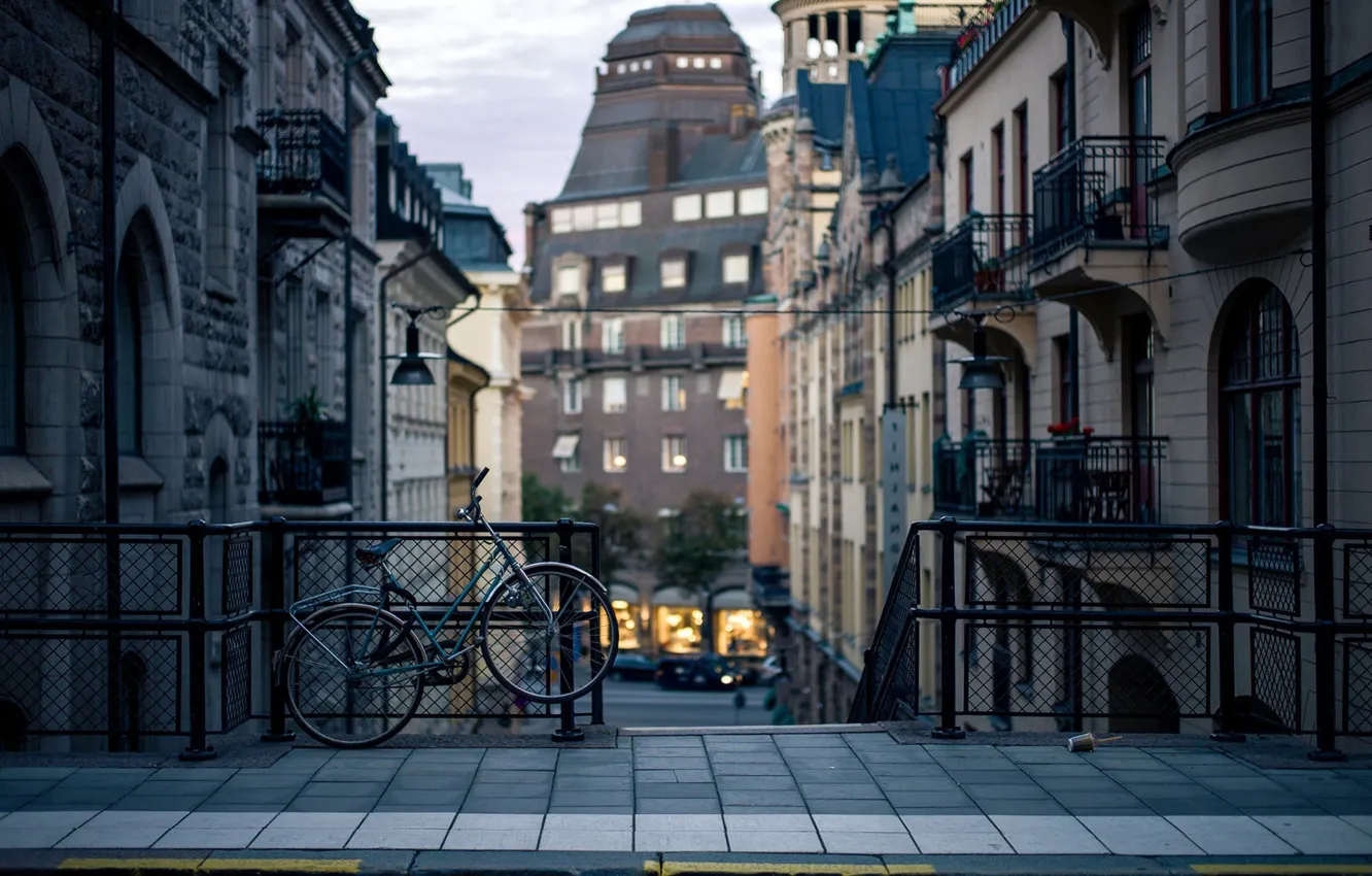 Photo wallpaper city, bicycle, road, Sweden, houses, buildings, Stockholm, railing