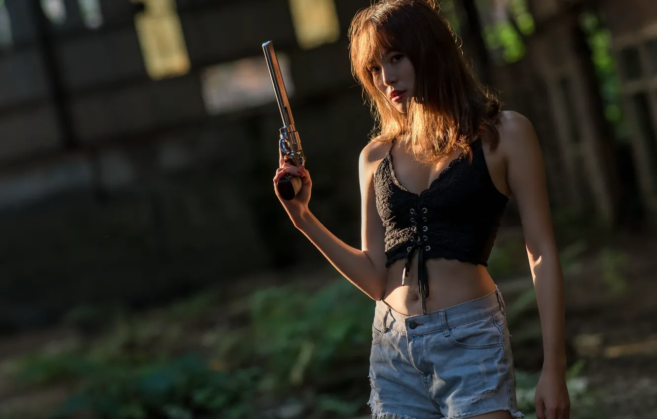 Photo wallpaper girl, weapons, revolver