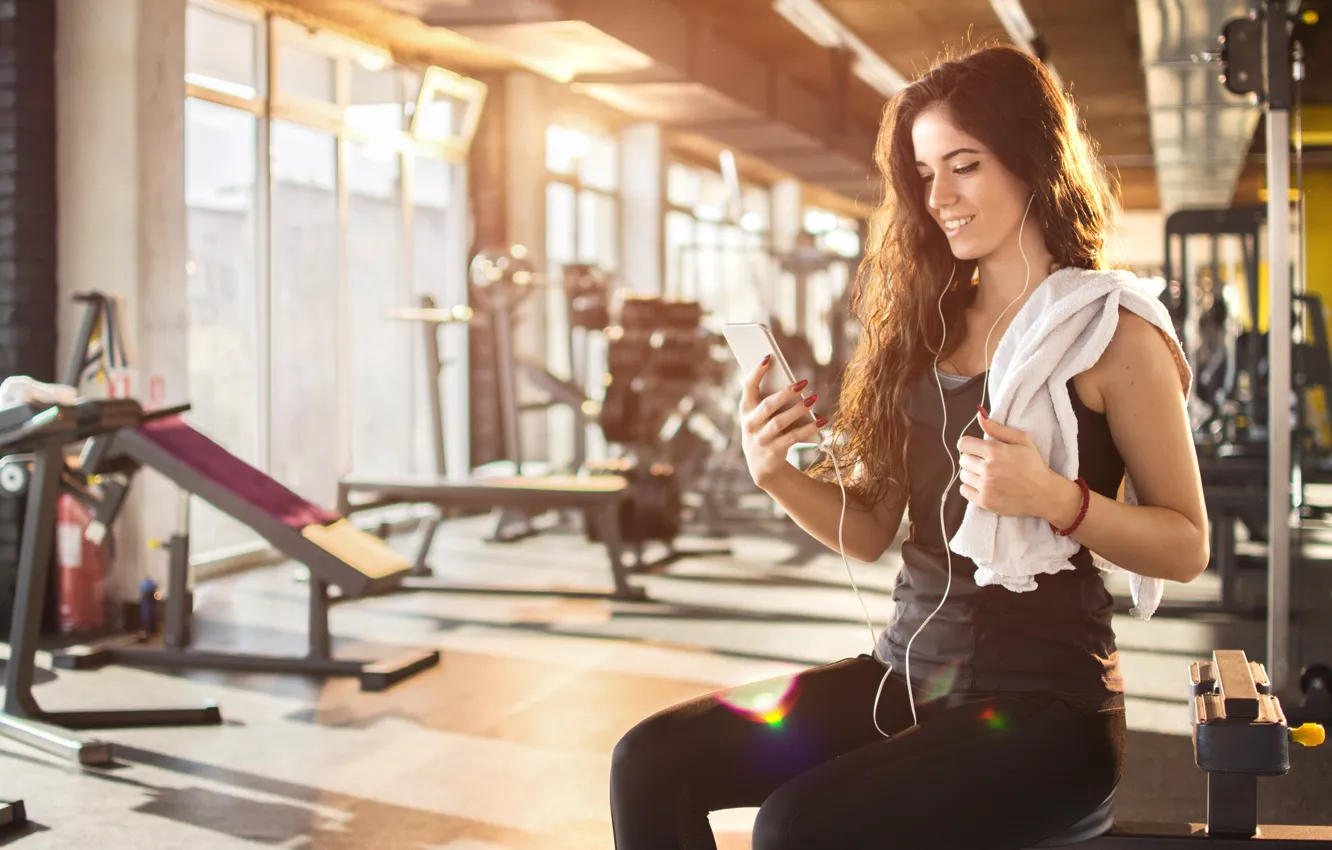 Photo wallpaper woman, gym, cellphone, smile...
