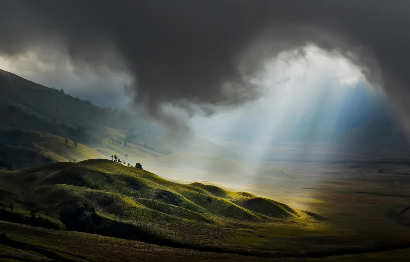 Photo wallpaper field, clouds, rays, light, clouds, hills, landscape
