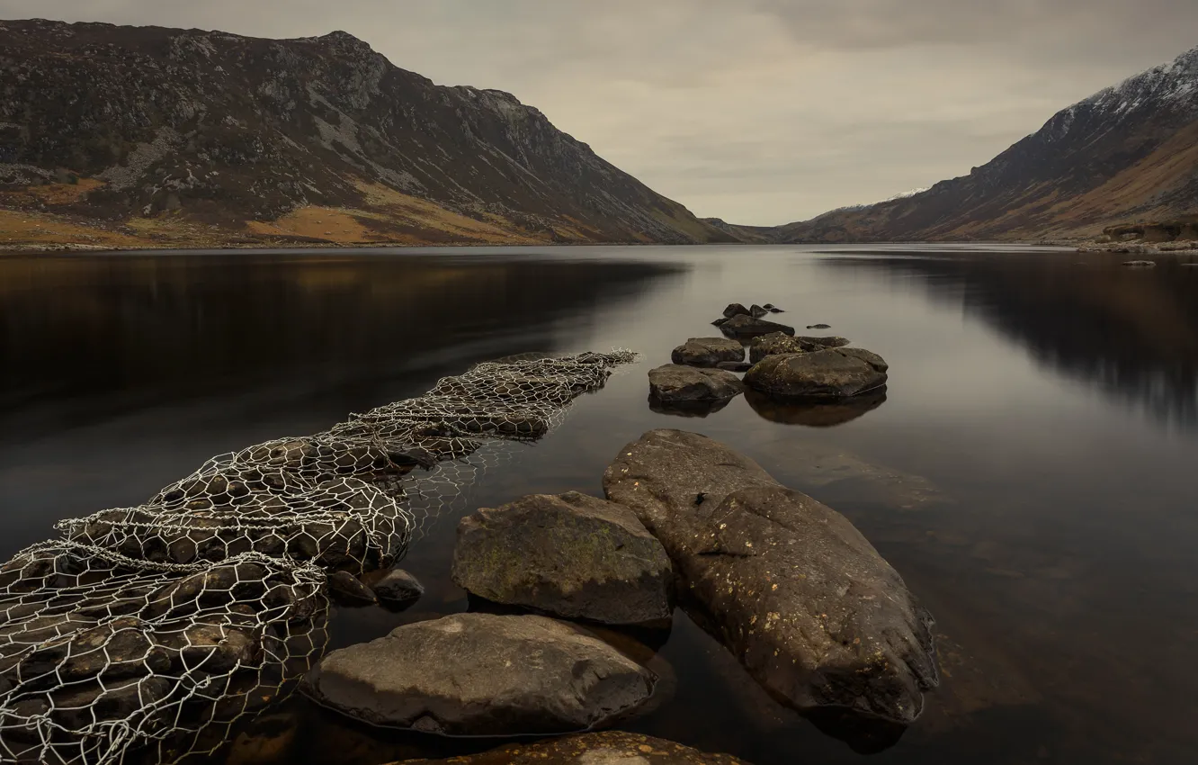 Photo wallpaper mountains, lake, stones, overcast, shore, network, slope, pond