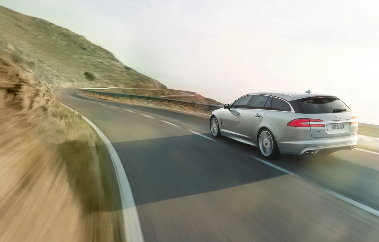 Photo wallpaper road, hills, shore, speed, Jaguar, silver, Jaguar, rear view