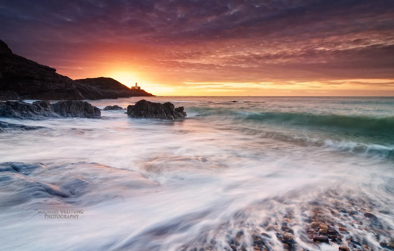 Photo wallpaper sea, wave, sunset, shore, lighthouse, UK, Wales, Michael Breitung