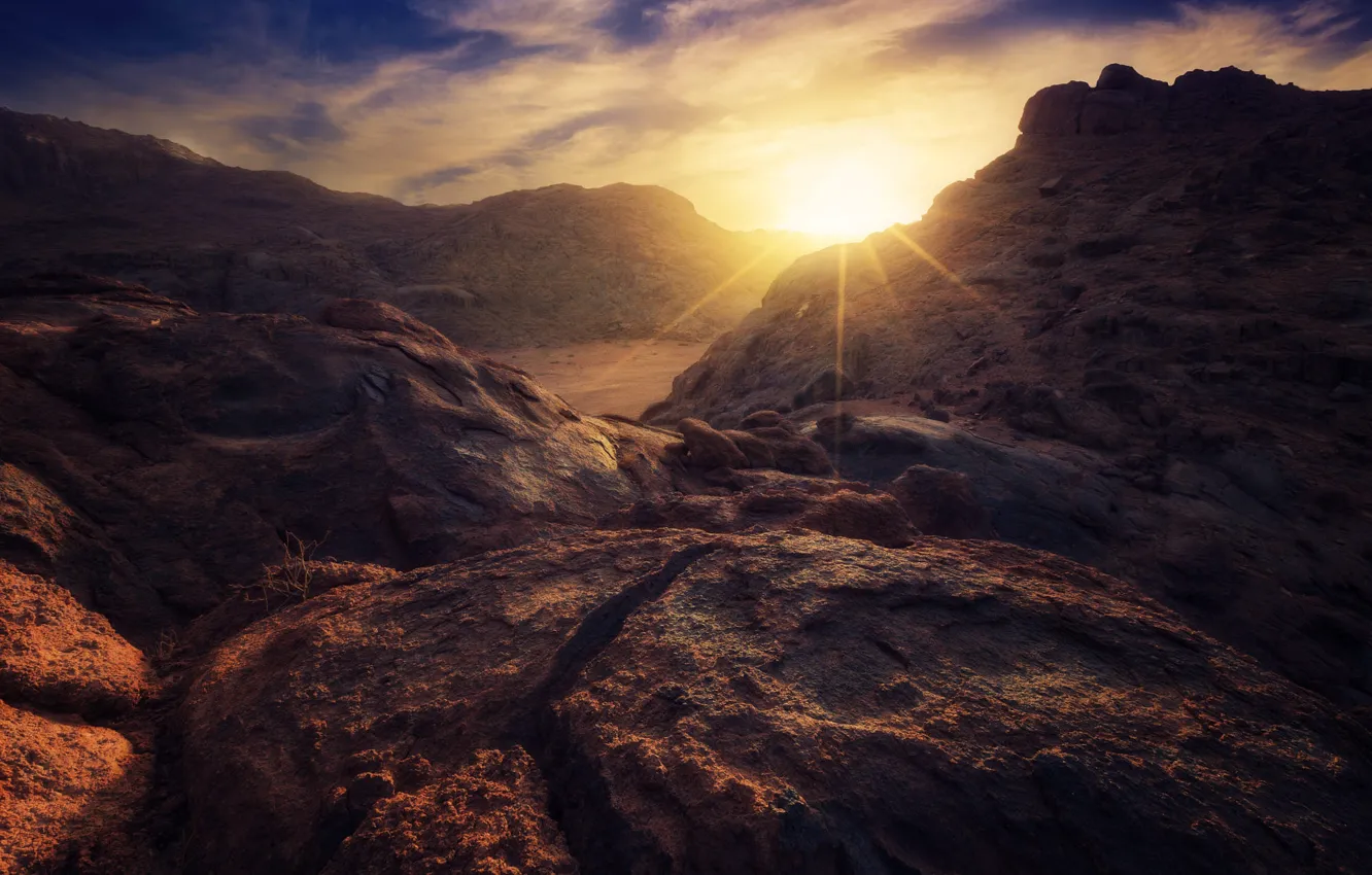 Photo wallpaper the sun, rays, mountains, stones, rocks, desert
