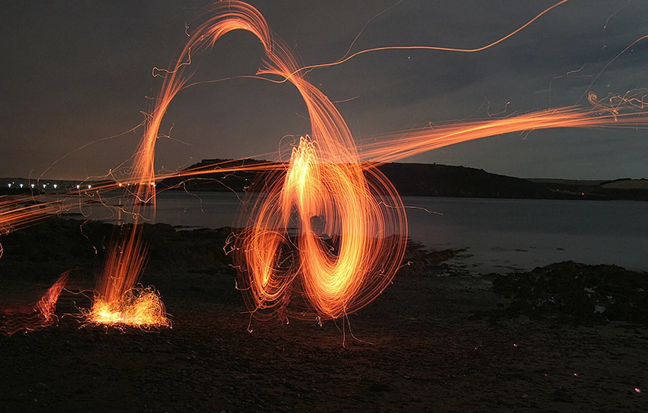 Photo wallpaper shore, the fire, sparks