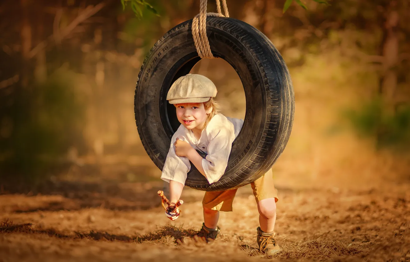 Photo wallpaper children, swing, boy, tires, tires, slingshot, naughty, Ksenia Lysenkova
