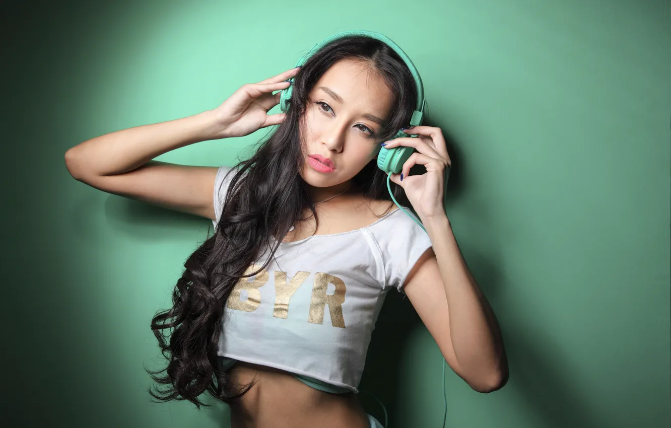 Photo wallpaper girl, face, pose, music, background, hair, hands, headphones