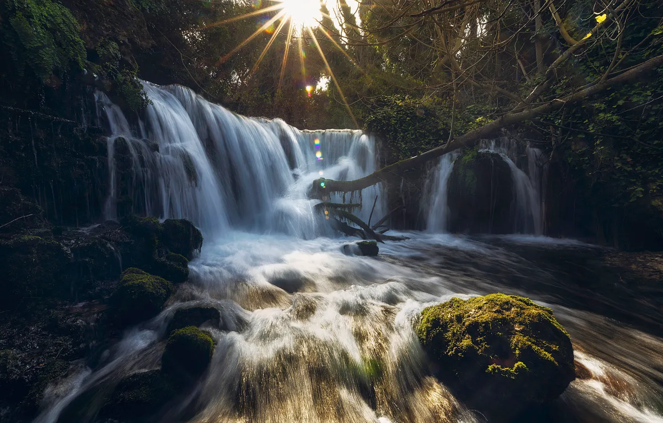 Photo wallpaper the sun, the dark background, stones, waterfall, log