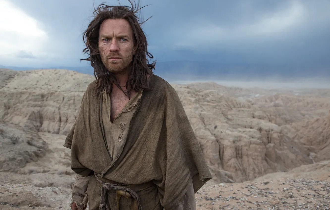 Photo wallpaper sky, long hair, desert, holy, clouds, rocks, man, sand