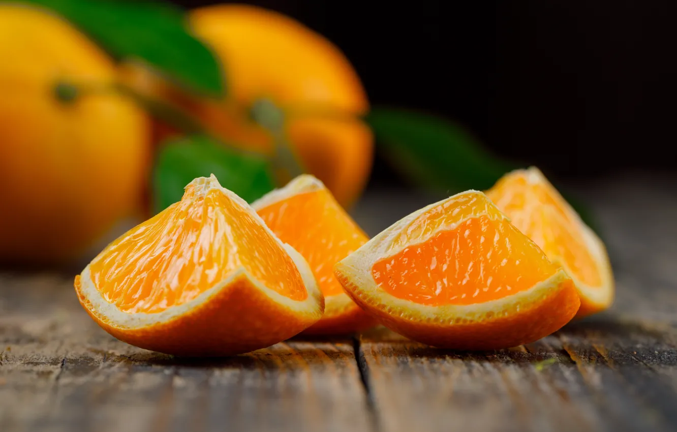 Photo wallpaper leaves, the dark background, Board, orange, slices, cut, bokeh, blurred background