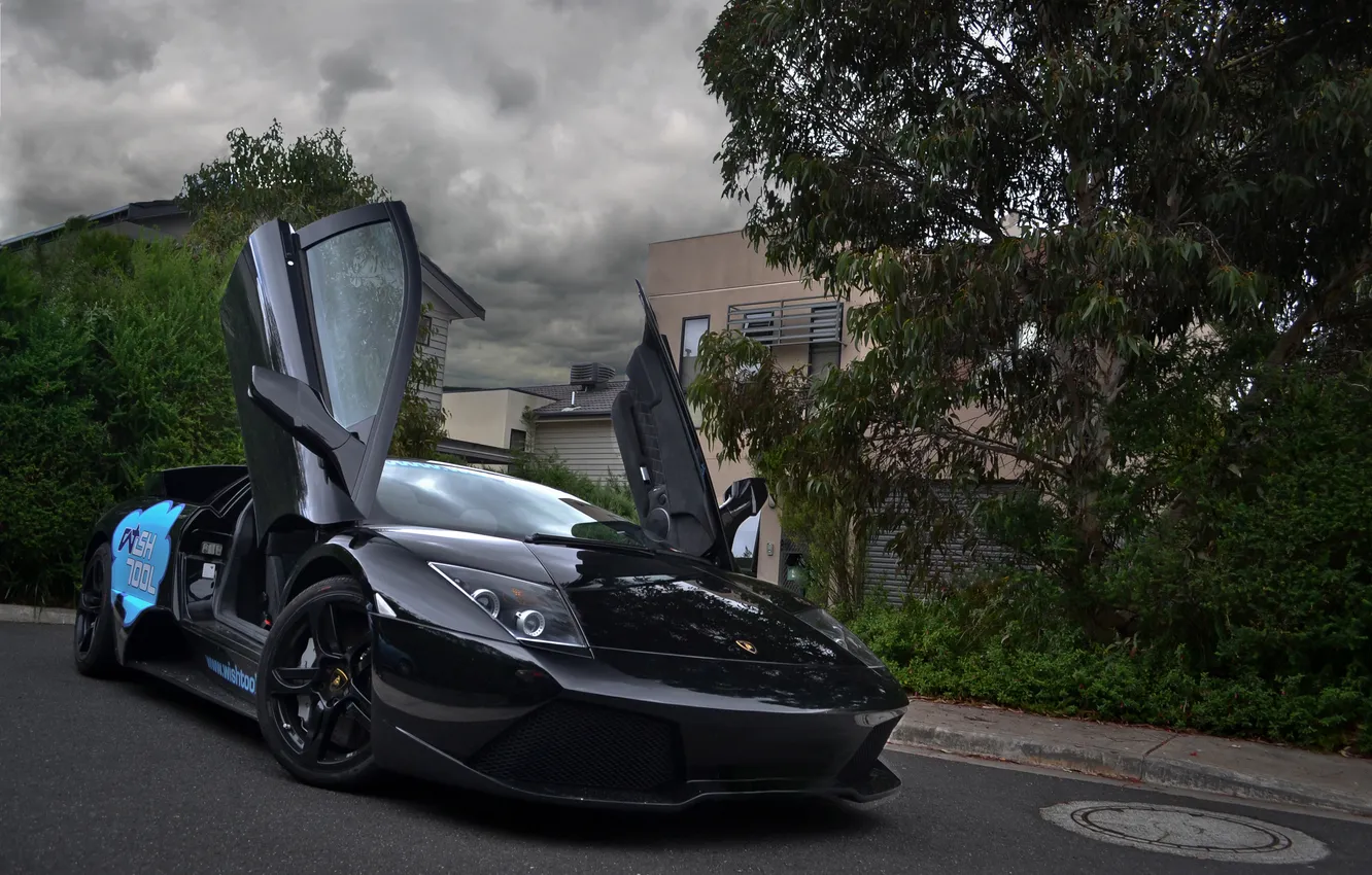 Photo wallpaper the sky, clouds, black, Lamborghini, black, side view, sky, murcielago
