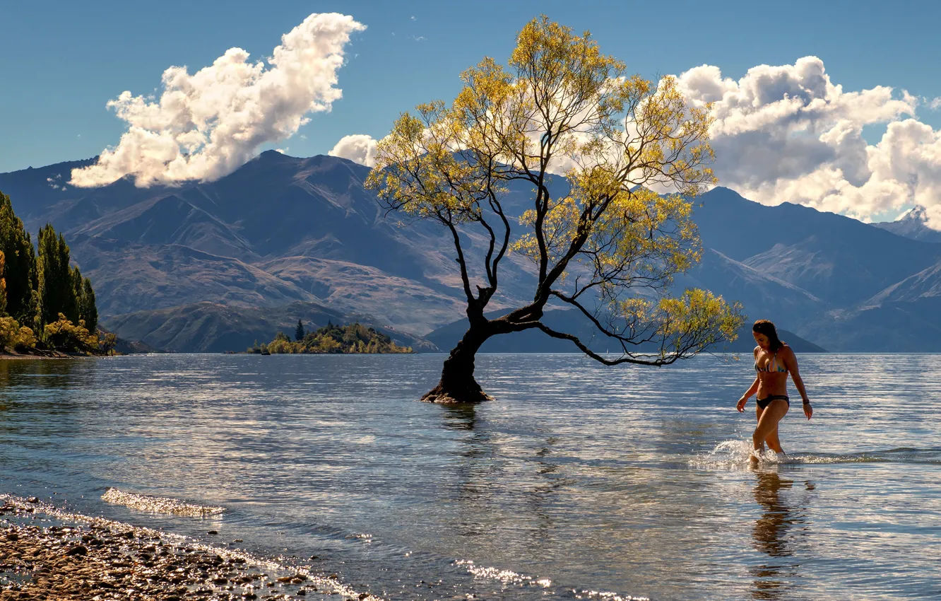 Photo wallpaper beach, summer, girl, clouds, trees, mountains, pebbles, lake