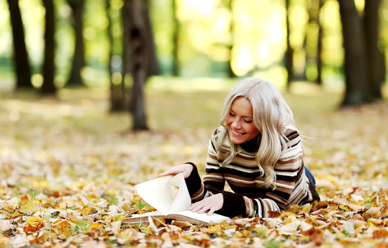 Photo wallpaper autumn, leaves, girl, trees, smile, blonde, book, reads