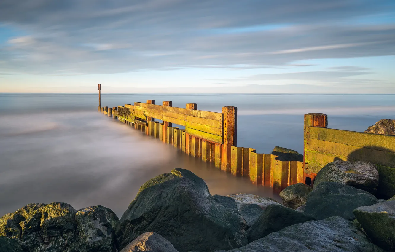 Photo wallpaper sea, the sky, clouds, light, yellow, stones, blue, shore