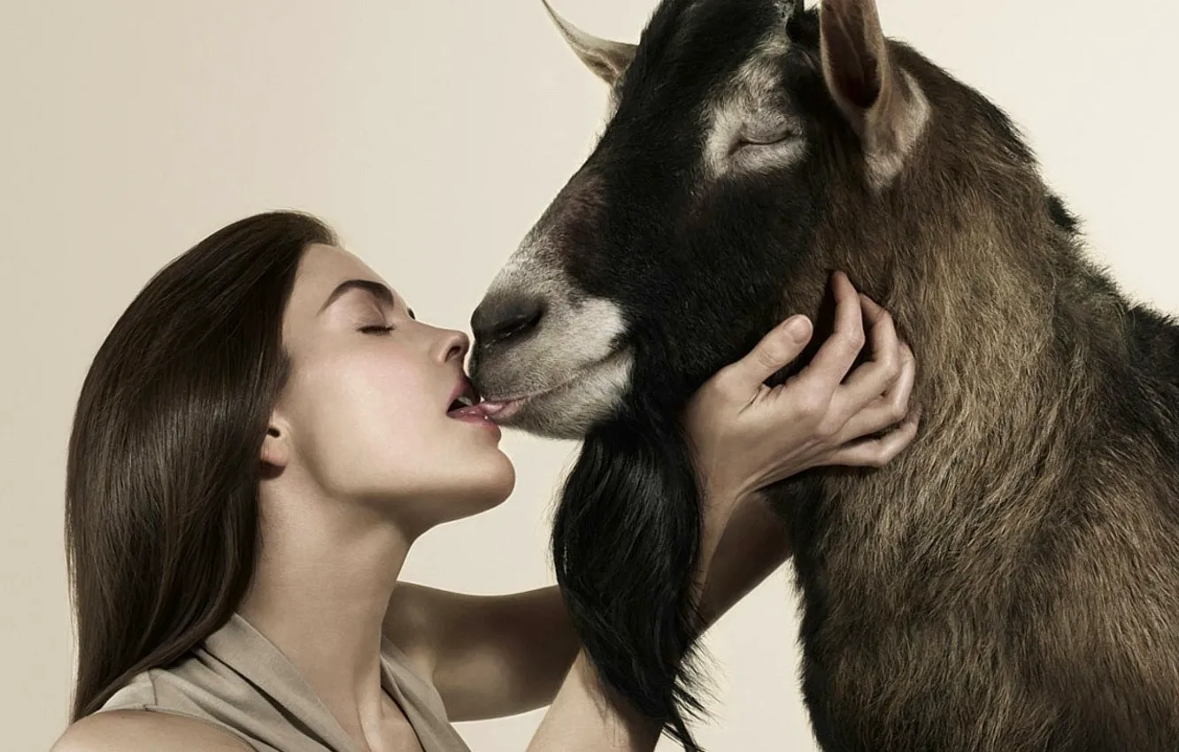 Photo wallpaper girl, goat, kiss