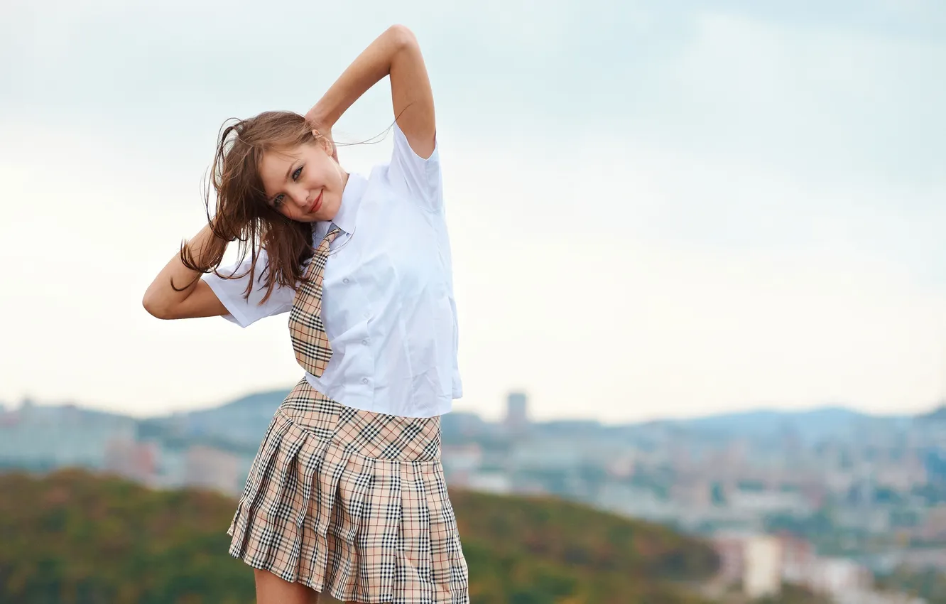 Photo wallpaper the sky, look, girl, the city, smile, the wind, hills, tie