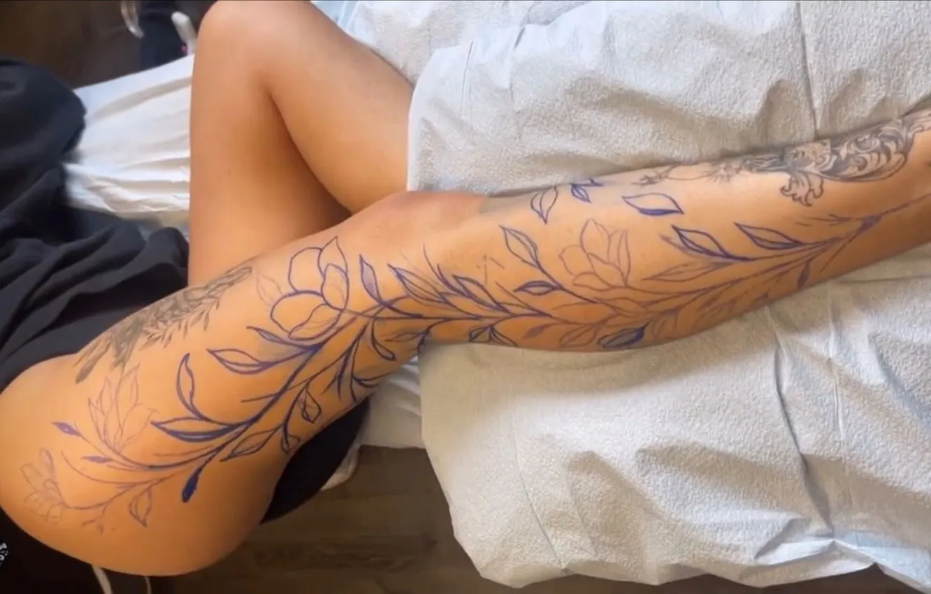 Photo wallpaper girl, tattoo, bed, tattoo on legs