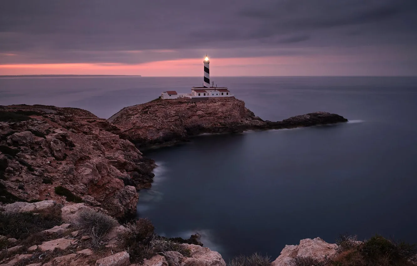 Photo wallpaper sea, sunset, stones, rocks, coast, lighthouse, horizon, Bay
