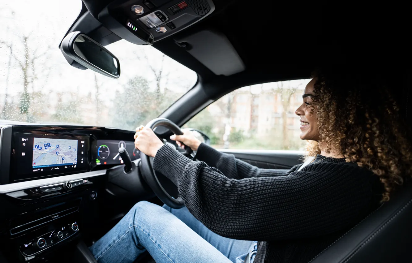 Photo wallpaper Girl, Smile, Salon, The wheel, Vauxhall, Electric, Vauxhall, Electric car