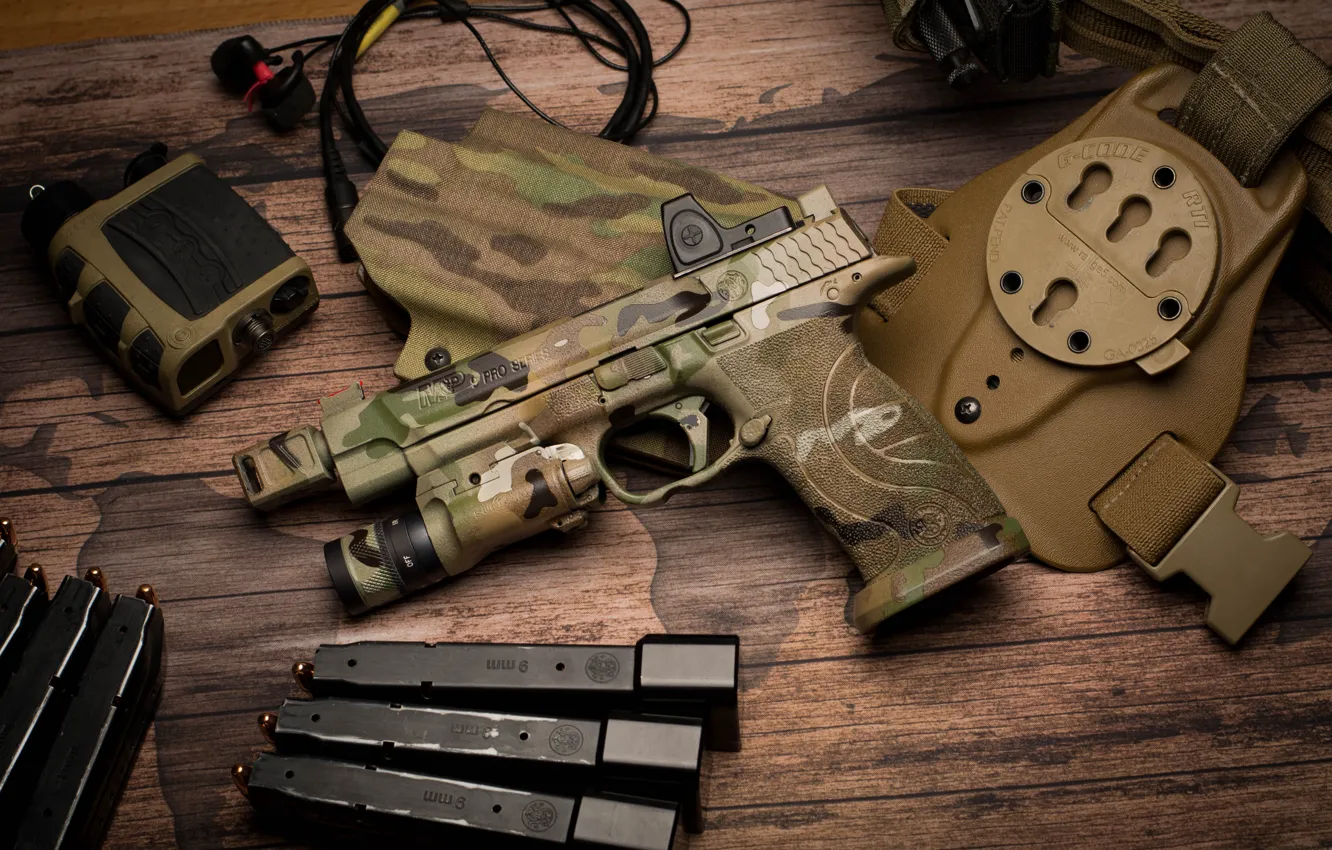 Photo wallpaper gun, table, flashlight