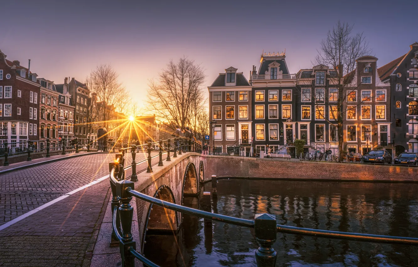 Photo wallpaper road, the sun, rays, light, sunset, bridge, the city, lights