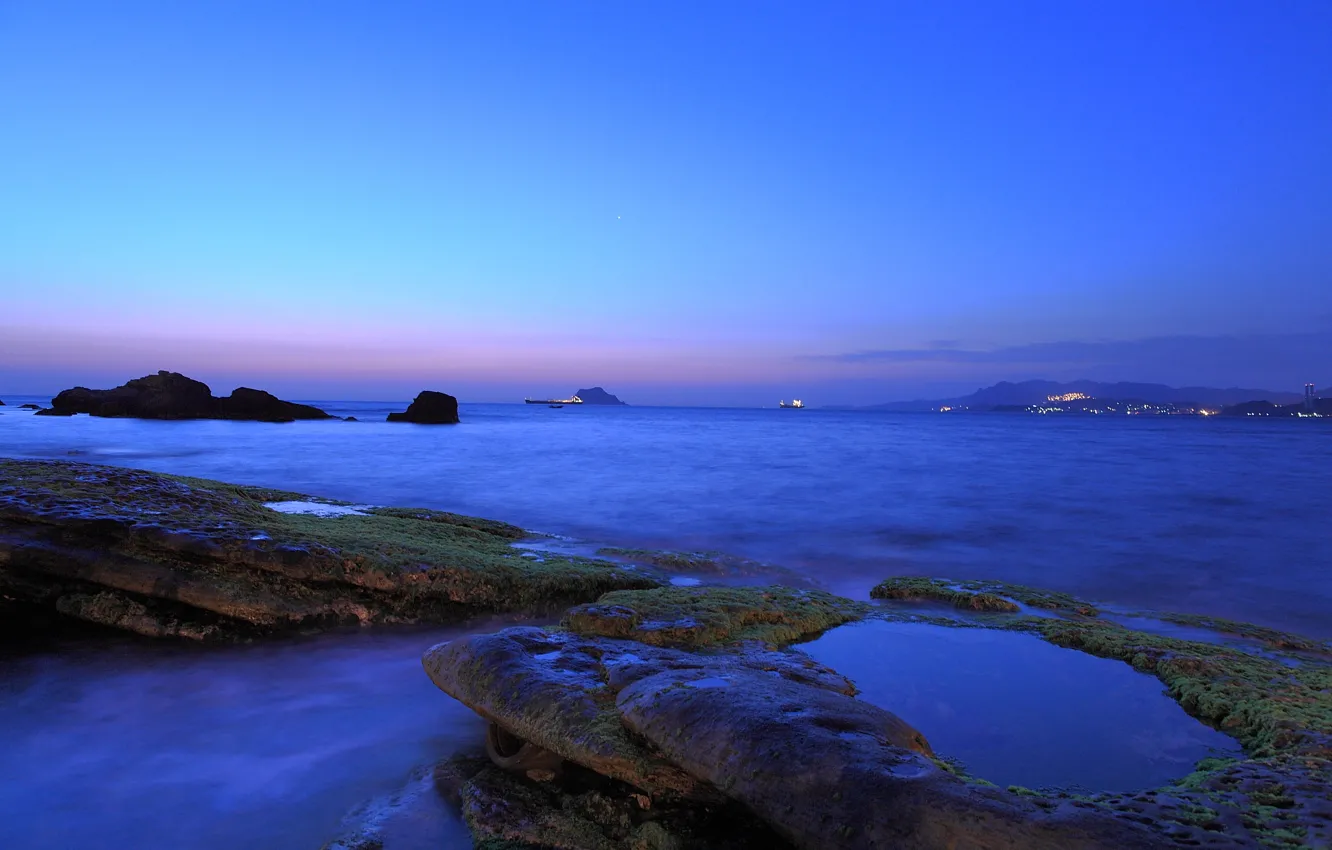 Photo wallpaper sea, the sky, clouds, the city, lights, blue, stones, shore