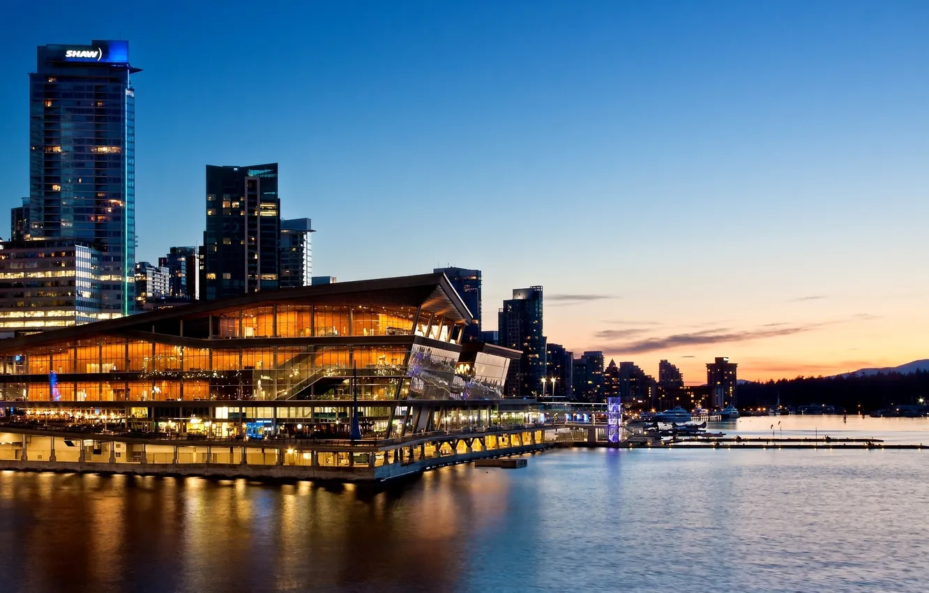 Photo wallpaper sunset, the city, lights, building, skyscrapers, the evening, Canada, Bay