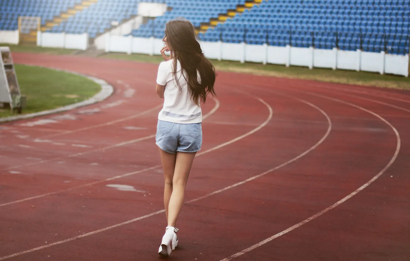 Photo wallpaper girl, shorts, brunette, stadium, treadmills