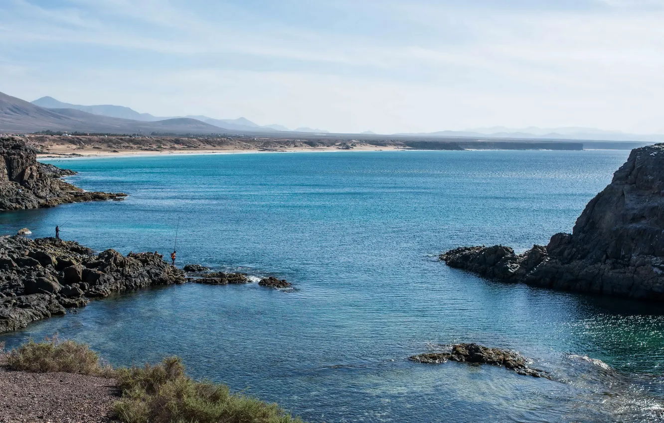 Photo wallpaper sea, stones, shore, fisherman, Spain, The Canary Islands, El Cotillo