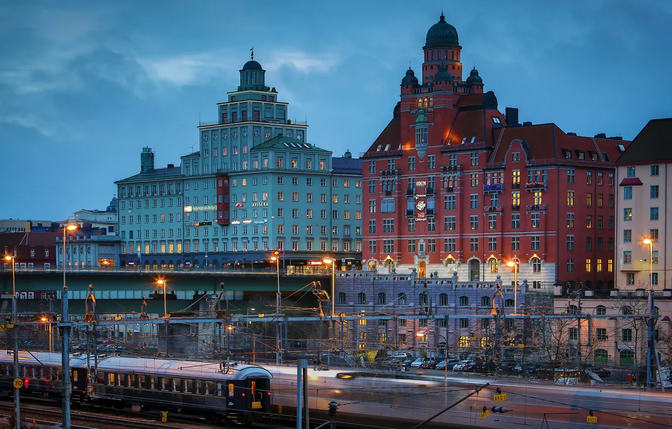 Photo wallpaper lights, building, home, the evening, lights, railroad, trains, Stockholm