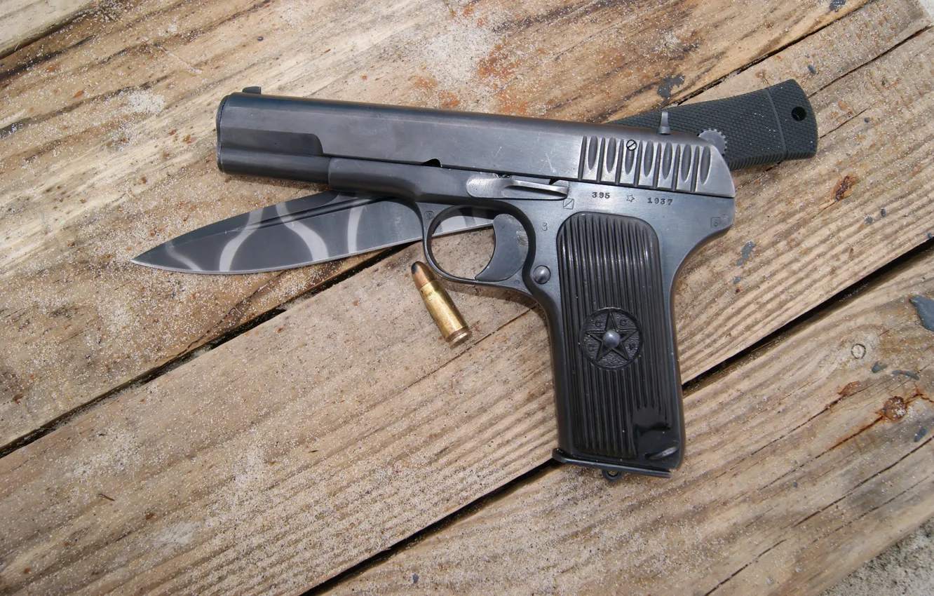 Photo wallpaper gun, knife, cartridges