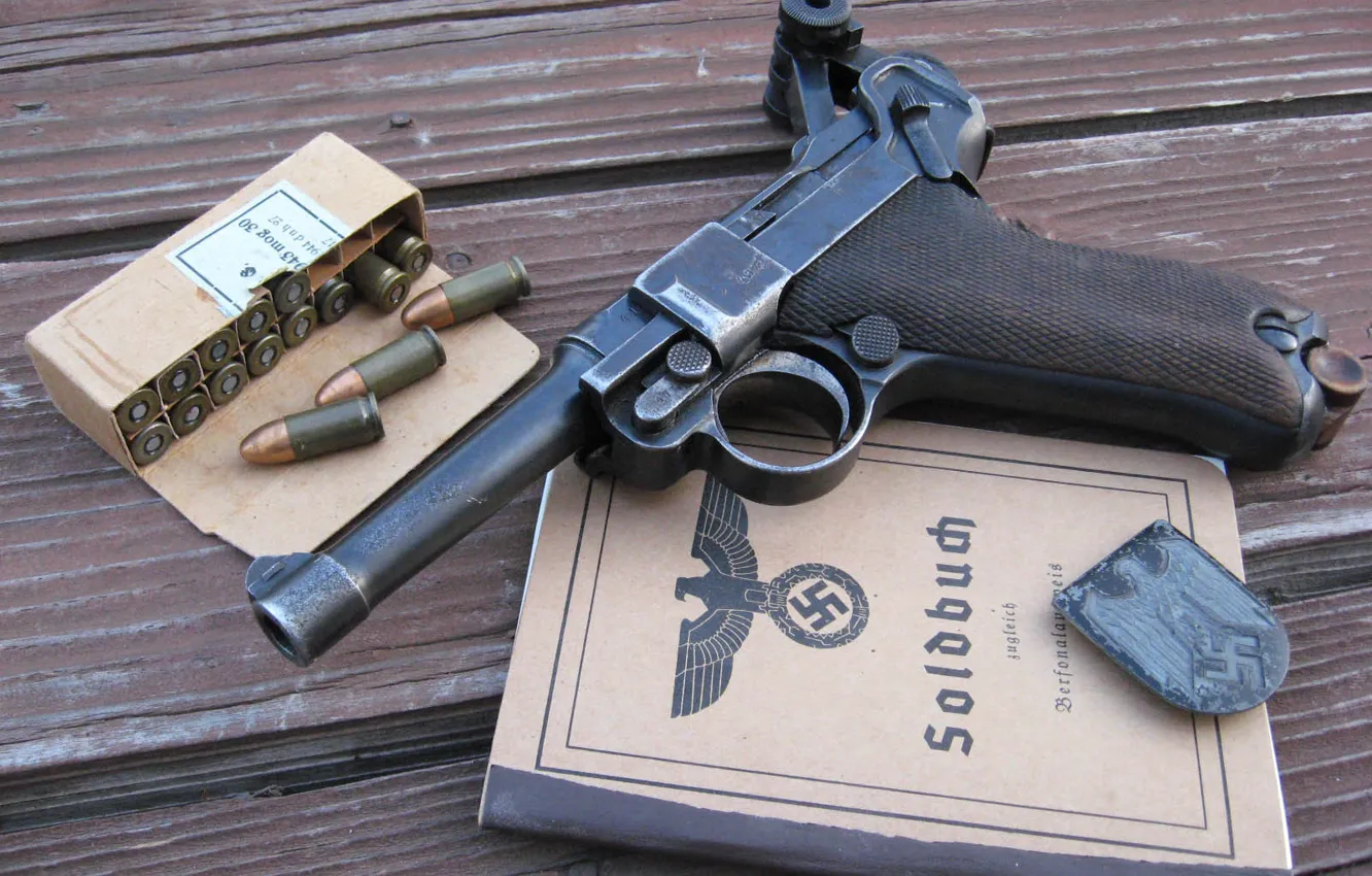 Photo wallpaper gun, cartridges, document