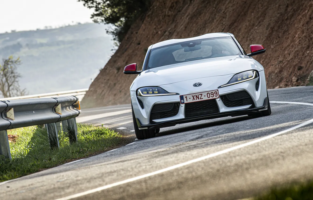 Photo wallpaper road, white, coupe, turn, the fence, Toyota, front, Supra