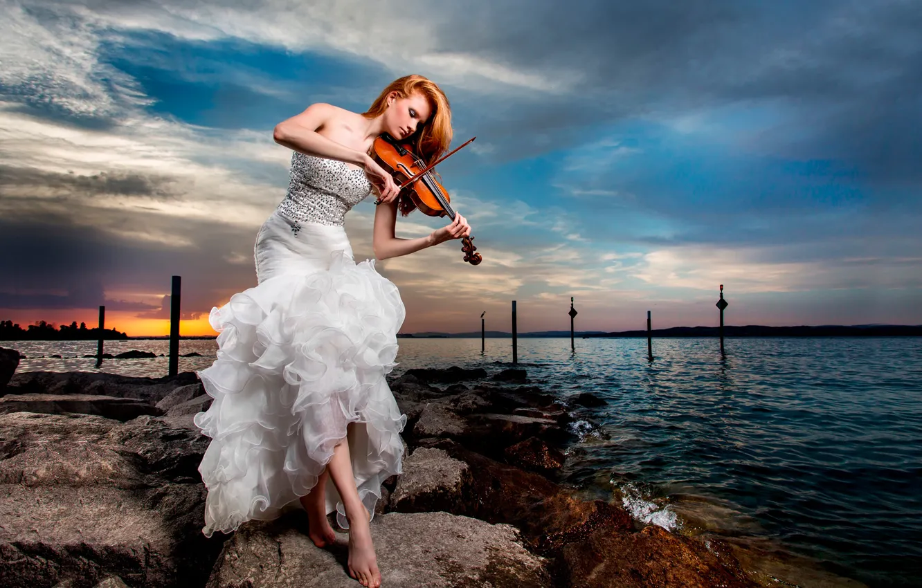 Photo wallpaper stones, shore, violinist