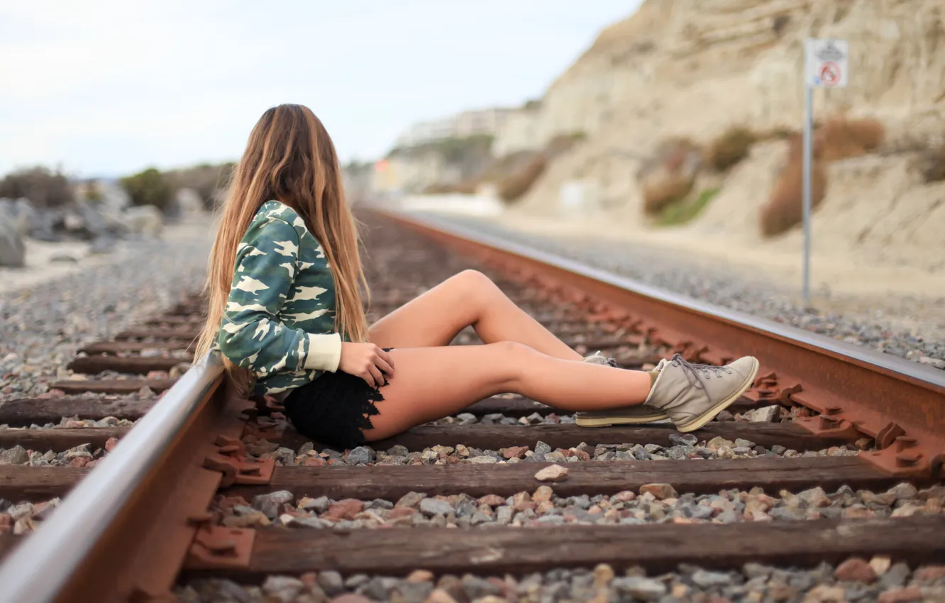 Photo wallpaper girl, rails, legs, sitting