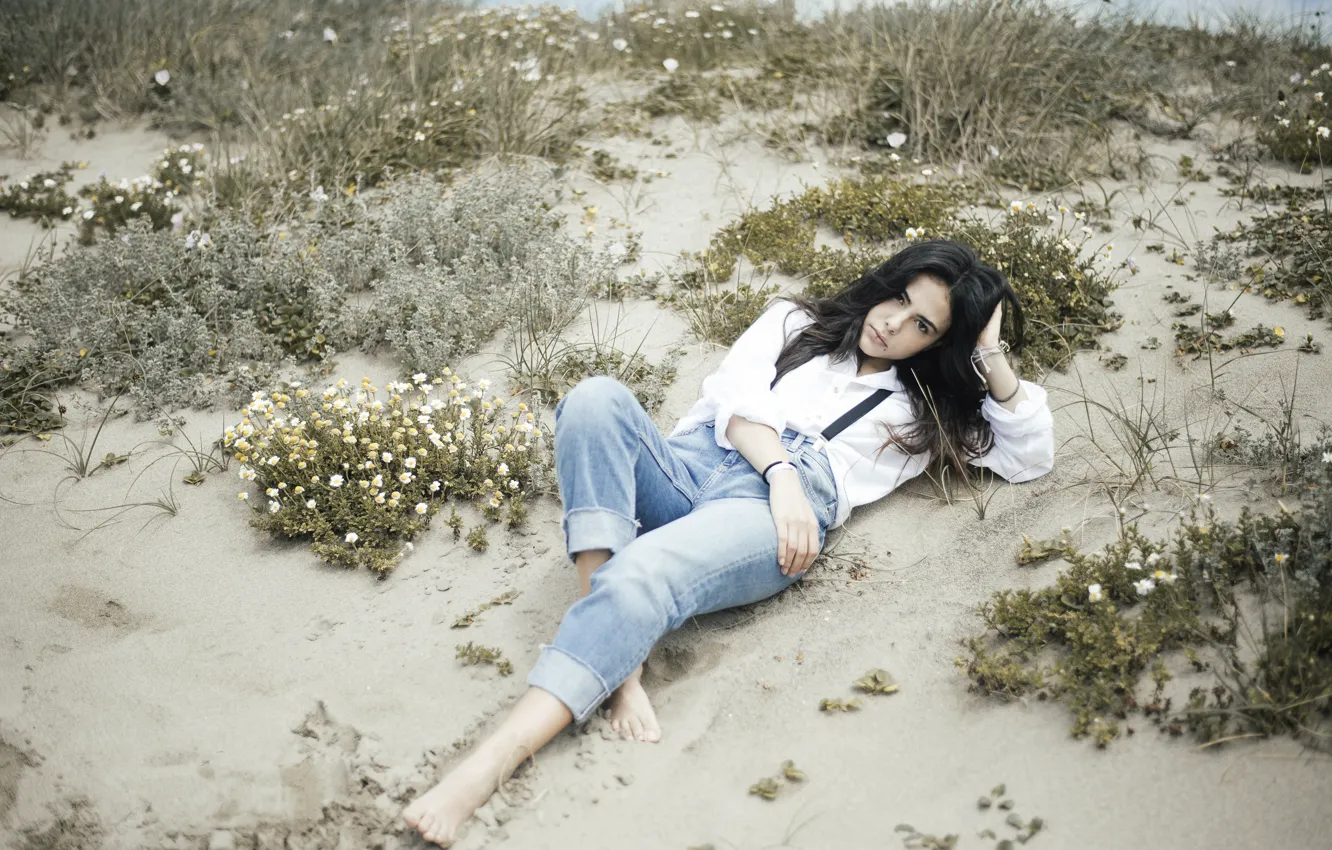 Photo wallpaper sand, beach, pose, jeans, brunette, lies, shirt, curls