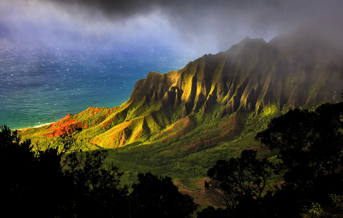 Photo wallpaper sea, light, mountains, fog, rocks, slope, lighting, haze